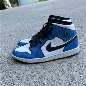 Nike Blue and White Sneakers with Classic Design